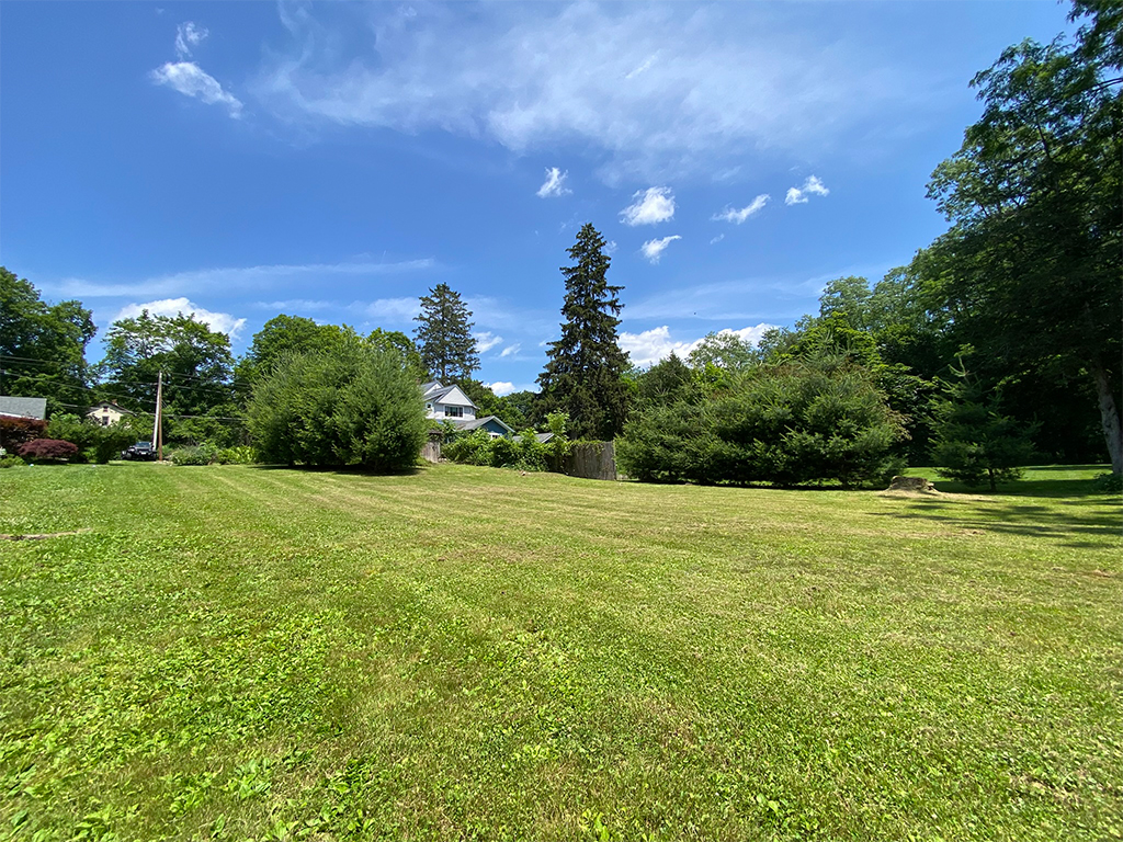 A view from the corner of the lot from the river.